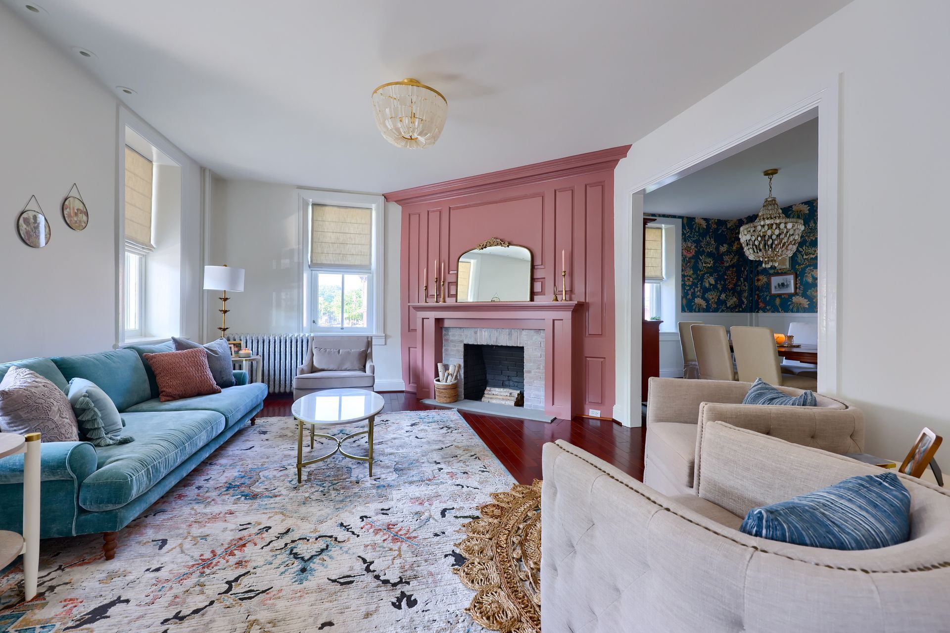 A living room filled with furniture and a fireplace.