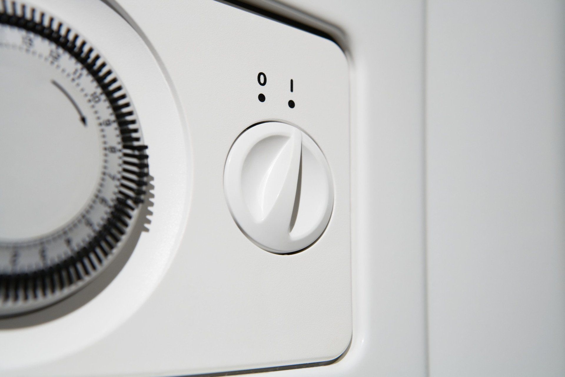 A white colour boiler in a kitchen