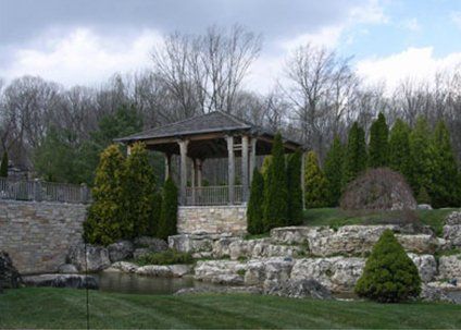 Professional Landscaping — Residential Landscape with Stones in Troy, MI