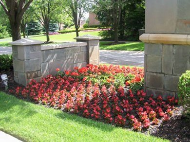 Stone Decoration and Landscape — Red Flowers and Stone Decoration in Troy, MI
