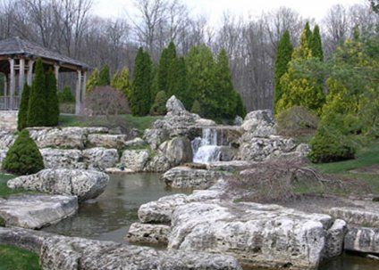 Pond Management — Pond Landscape with Stones in Troy, MI