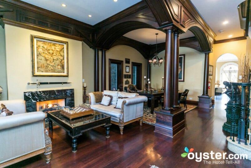 A living room filled with furniture and a fireplace.