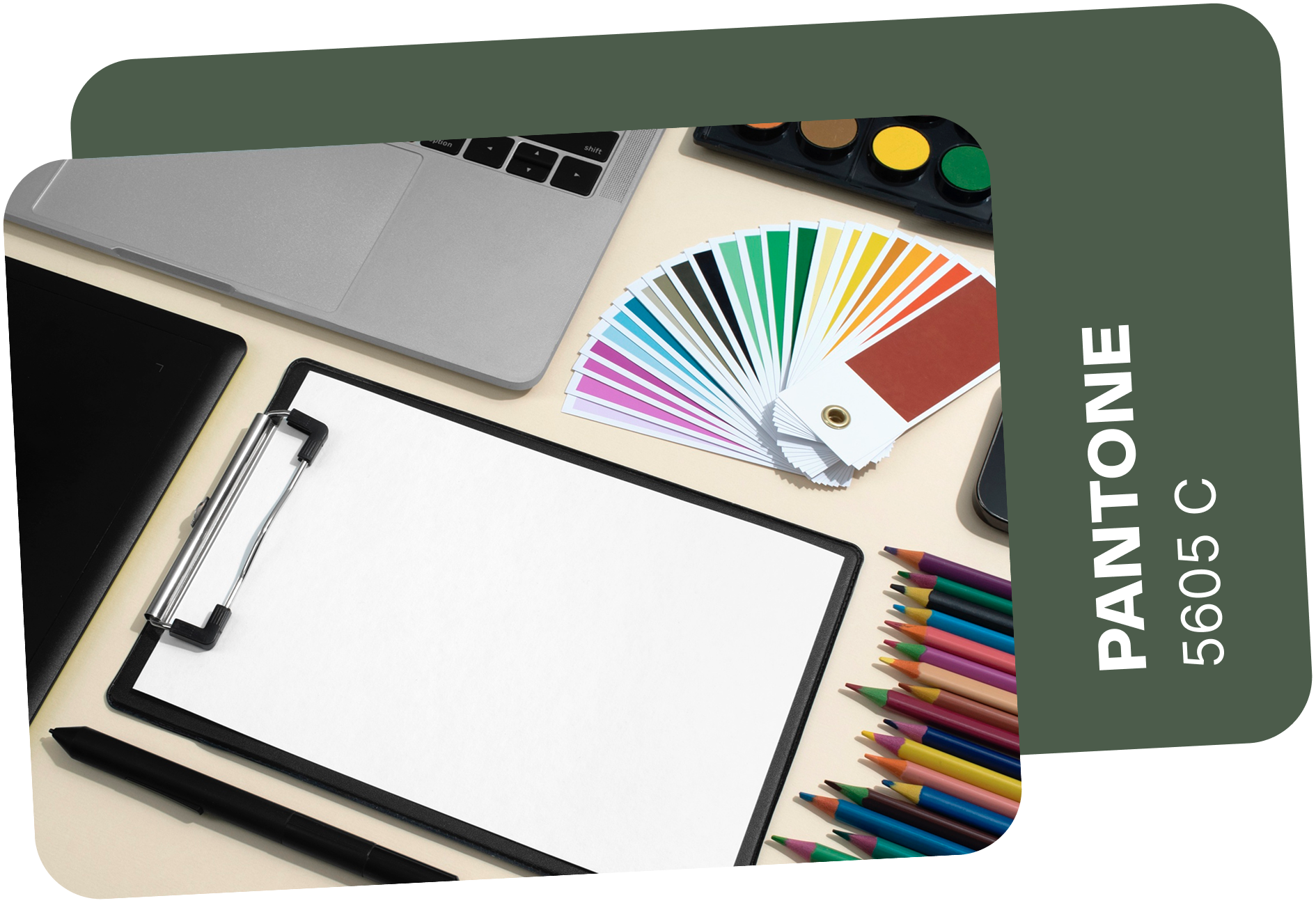 Workspace with laptop, tablet, drawing supplies, and color palette; Pantone 5605 C color card.