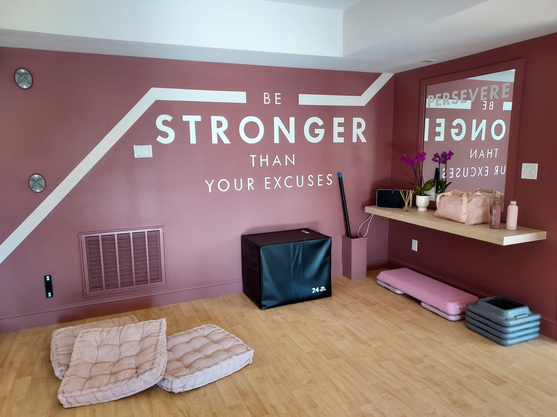 A dining room with a table and chairs and a chandelier