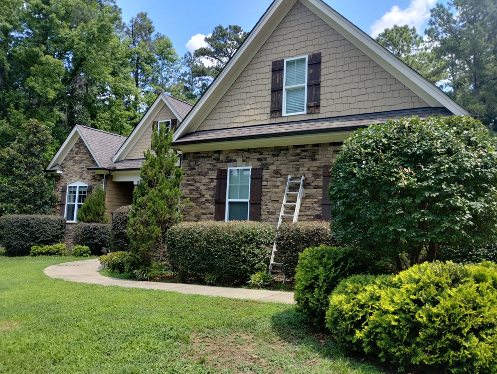 House with a ladder in front of it — Raleigh, NC — Untied Painting, LLC