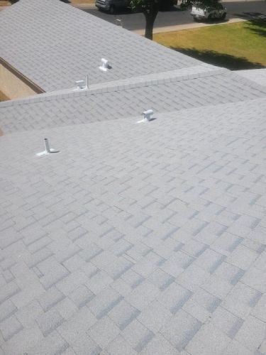 A roof with a lot of shingles on it