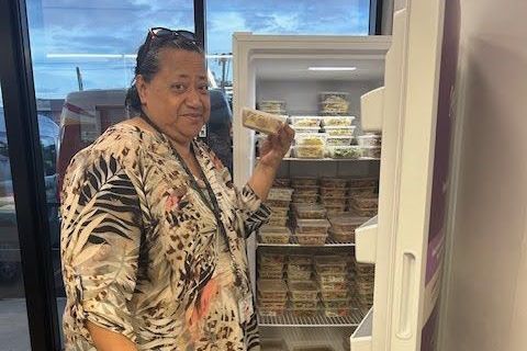 a boy and a girl are posing for a picture together