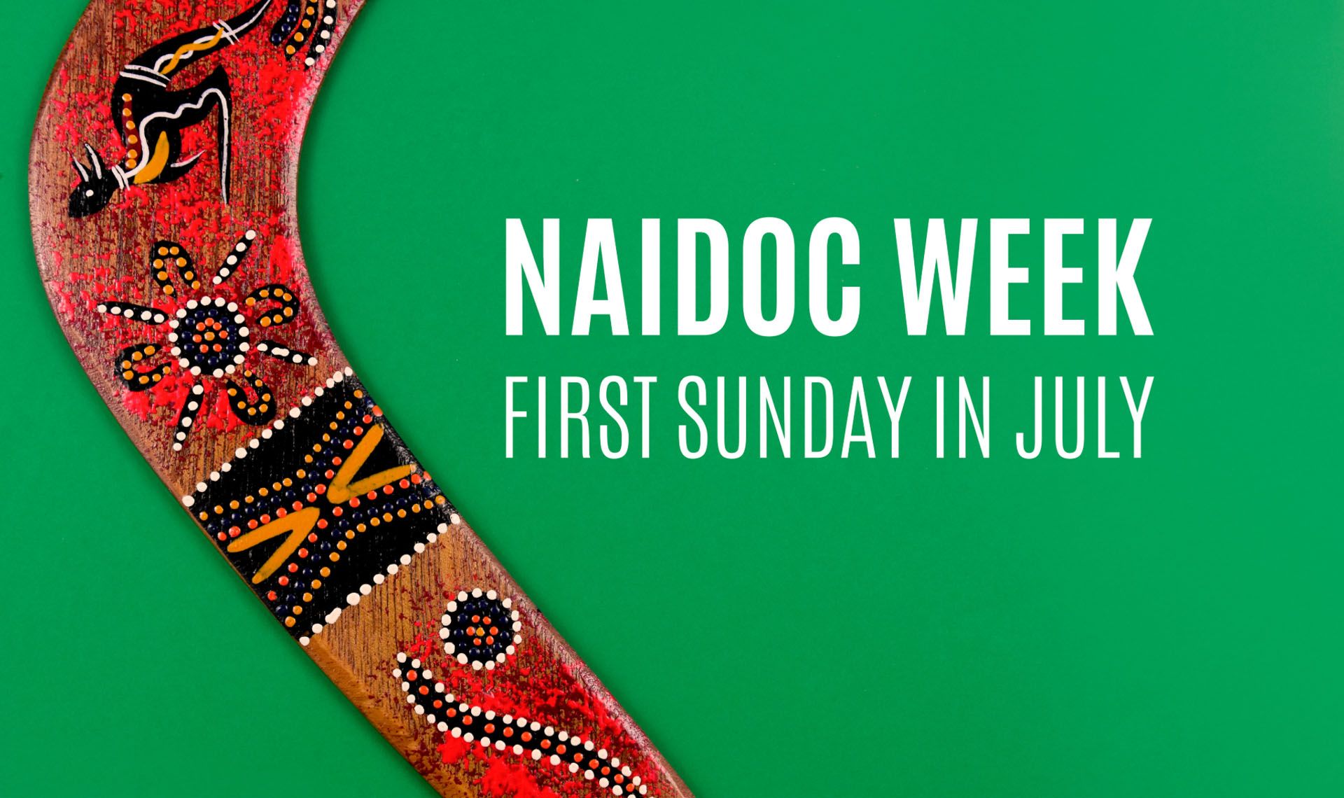 A colorful boomerang is on a green background with the words naidoc week first sunday in july.