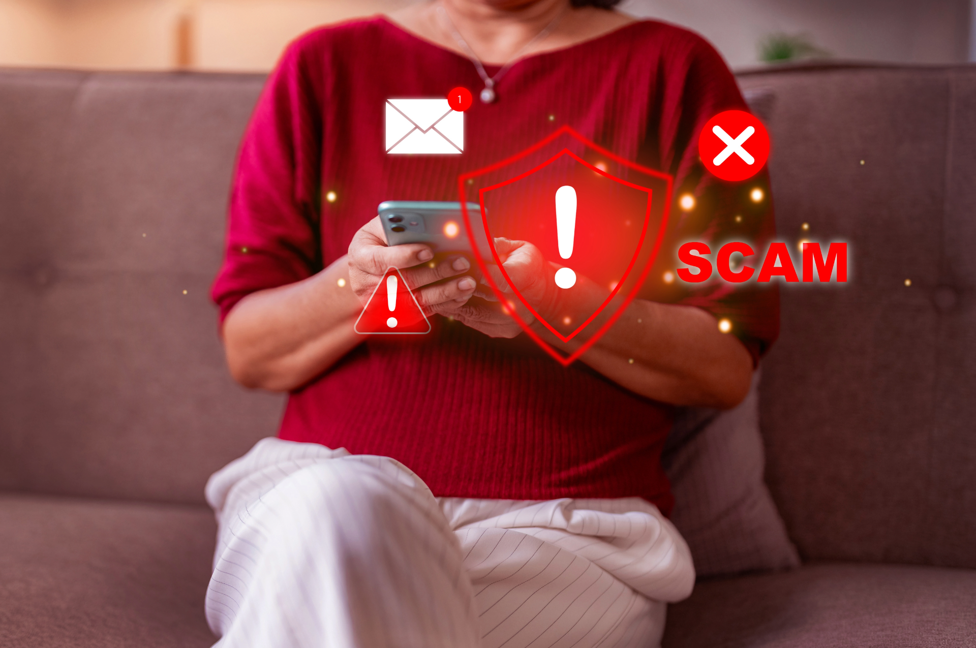 Woman on couch with phone, red alerts and 