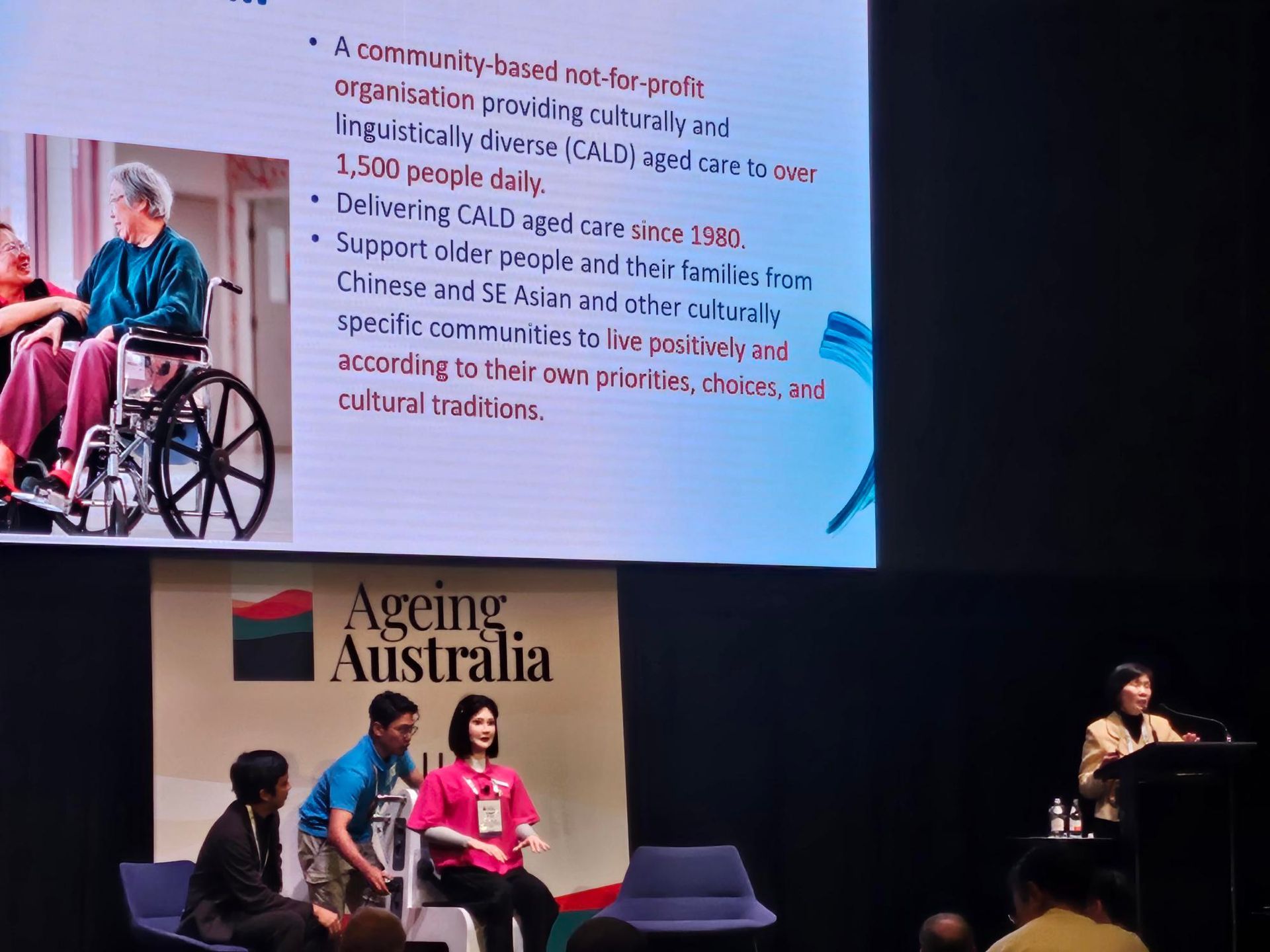 A woman is giving a presentation on ageing australia