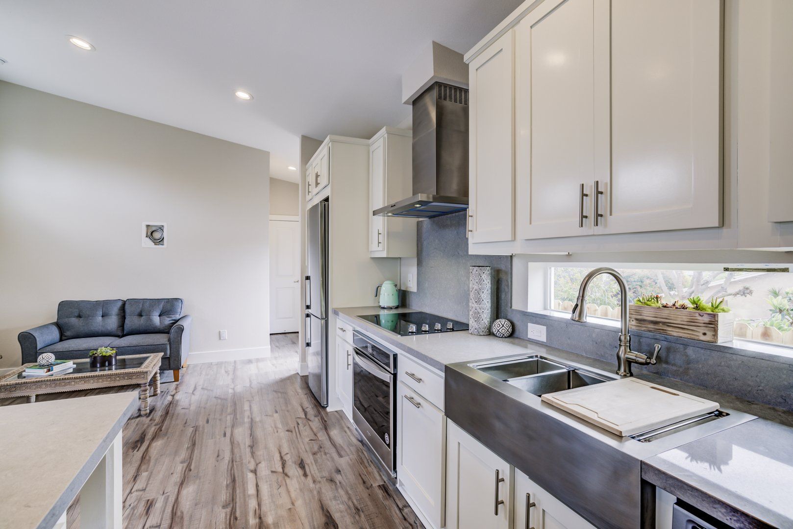 Stainless Steel Appliances and Metal Farmhouse Sink