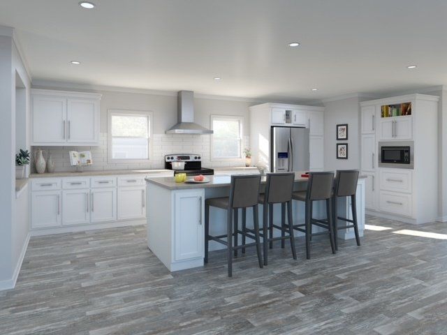 U Shaped Kitchen with Island that has Seating