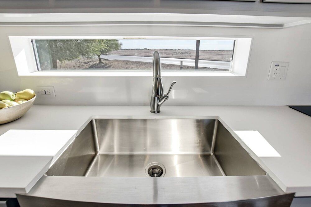 Window Above Stainless Steel Kitchen Sink