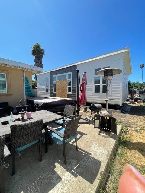 Pulling Accessory Dwelling Unit on Trailer into Backyard