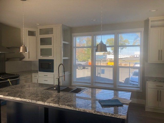 Kitchen with Pendant Lighting Over Island