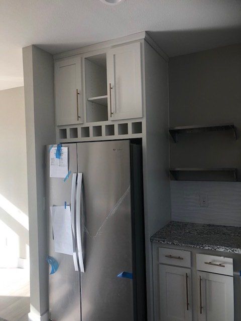 Cabinets Over Stainless Steel Fridge