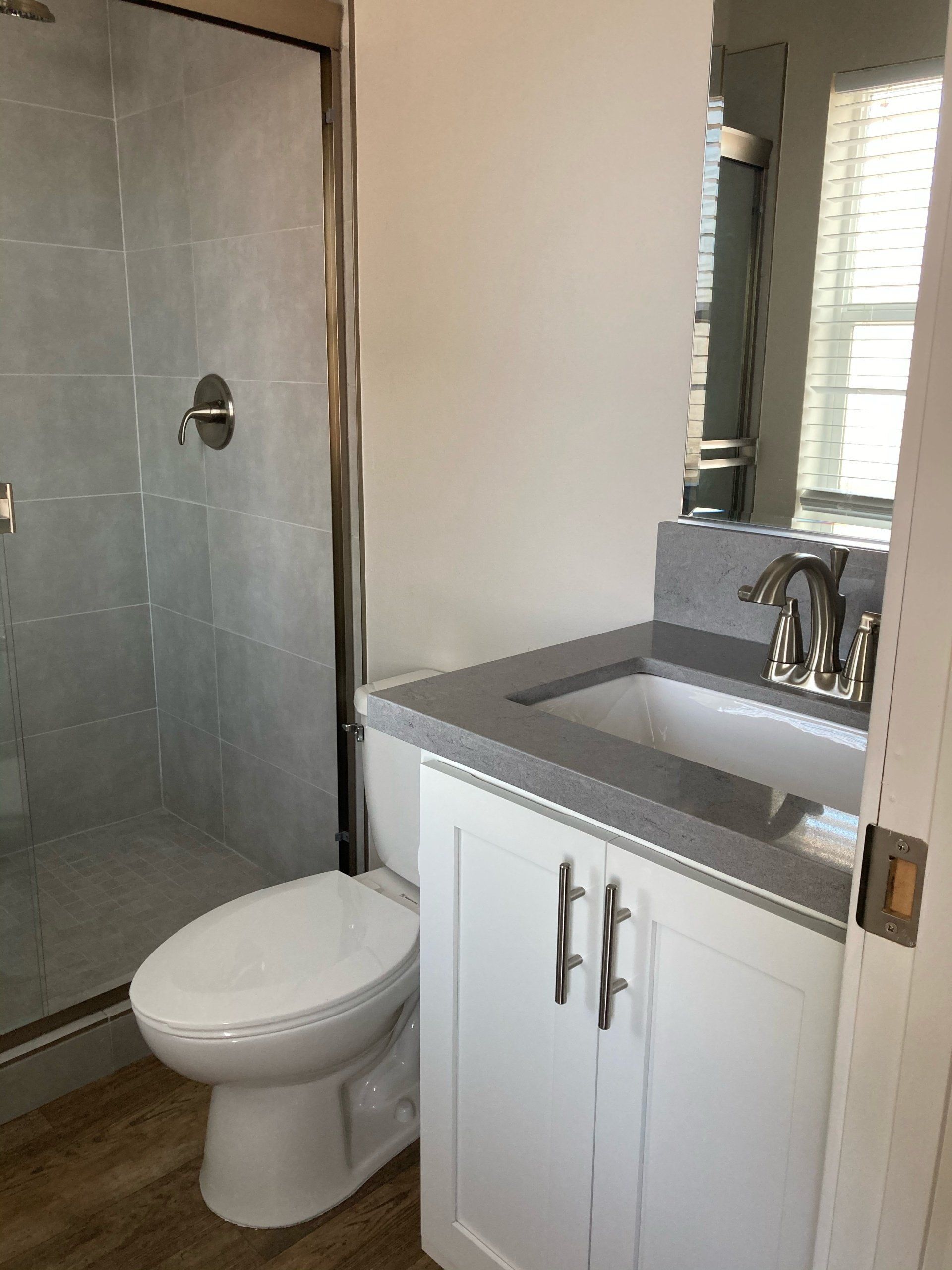 Bathroom with Tile Shower and Glass Door