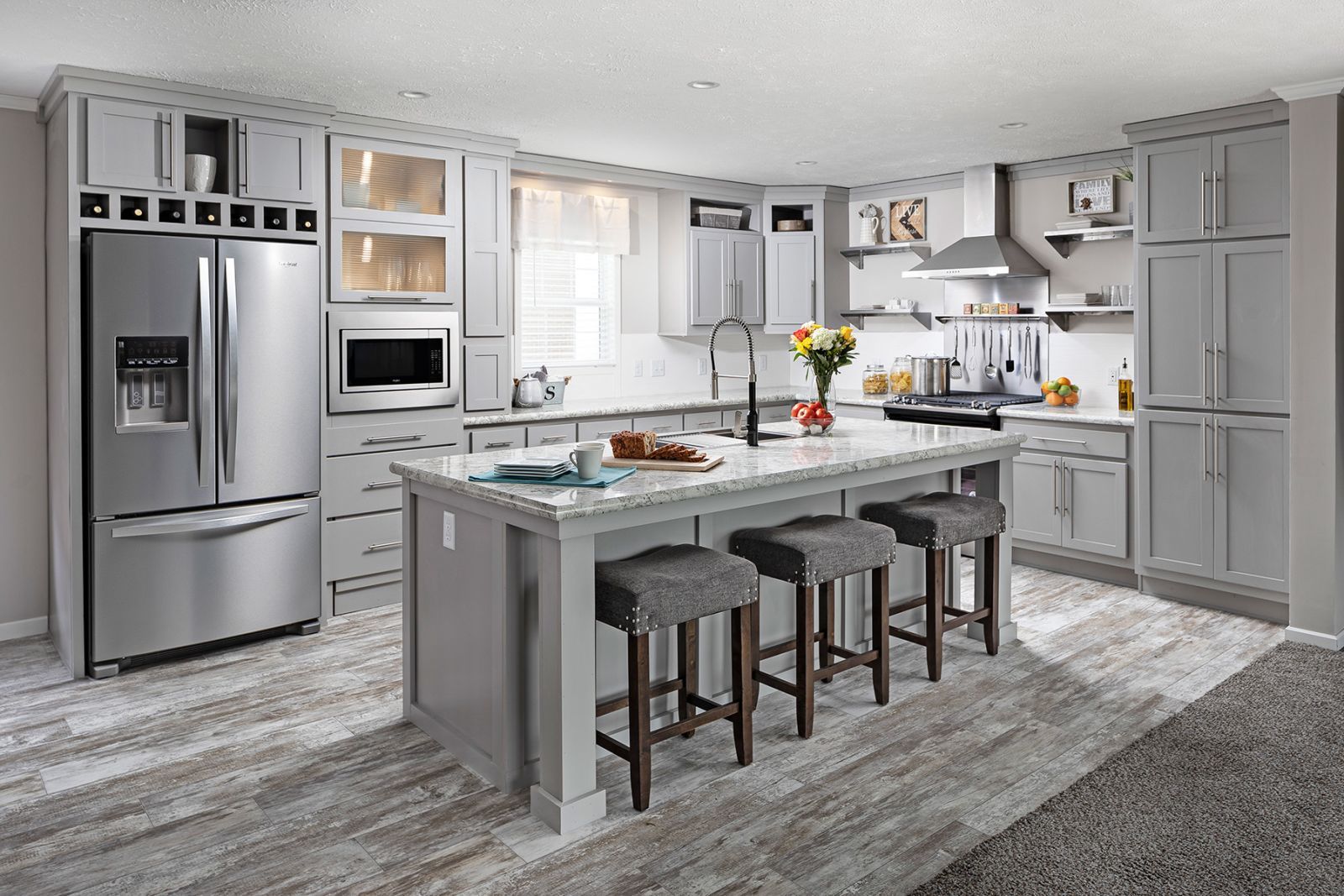 Kitchen with Island and Stainless Steel Appliances