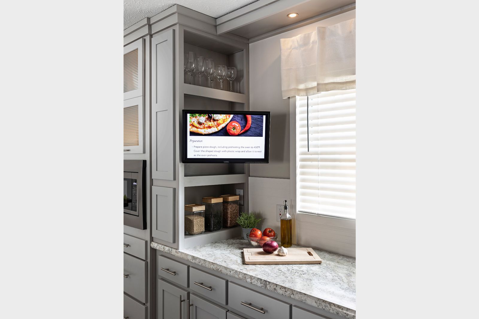 TV Mounted Above Kitchen Counter