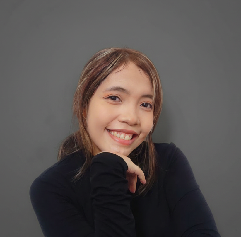 Jean Montes, Perpetual Homes ADU. Woman with shoulder-length brown hair smiling, wearing a black long-sleeved shirt.