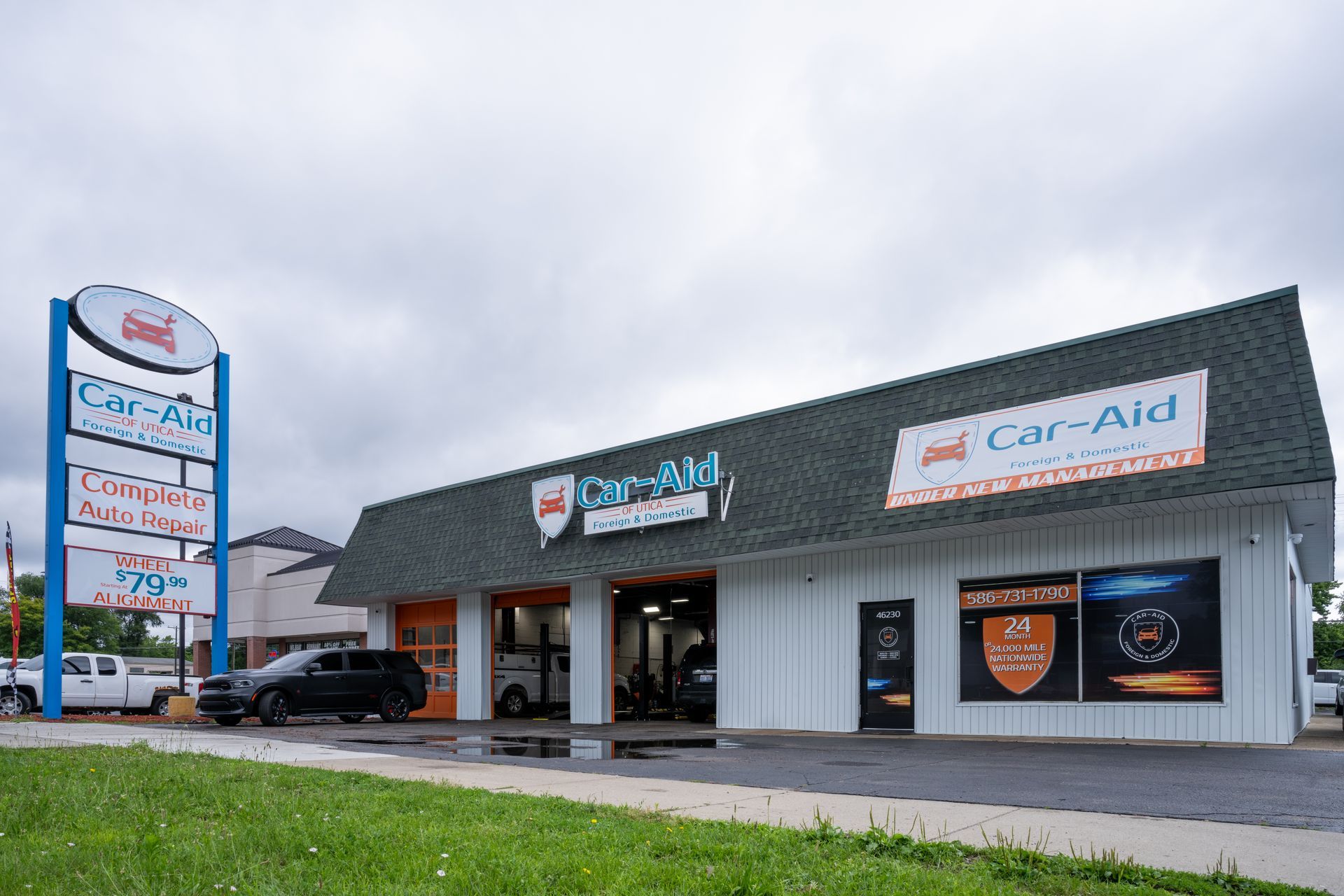 A car wash with a sign that says car aid on it
