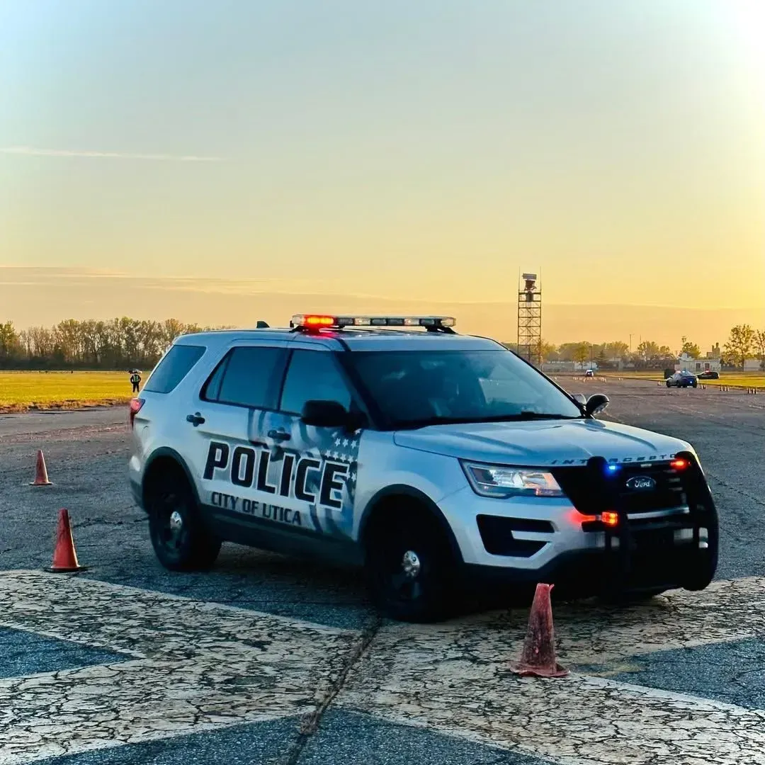A police car is parked on the side of the road