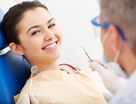 Happy patient — Oral & Maxillofacial Pathology & Surgery Dentists