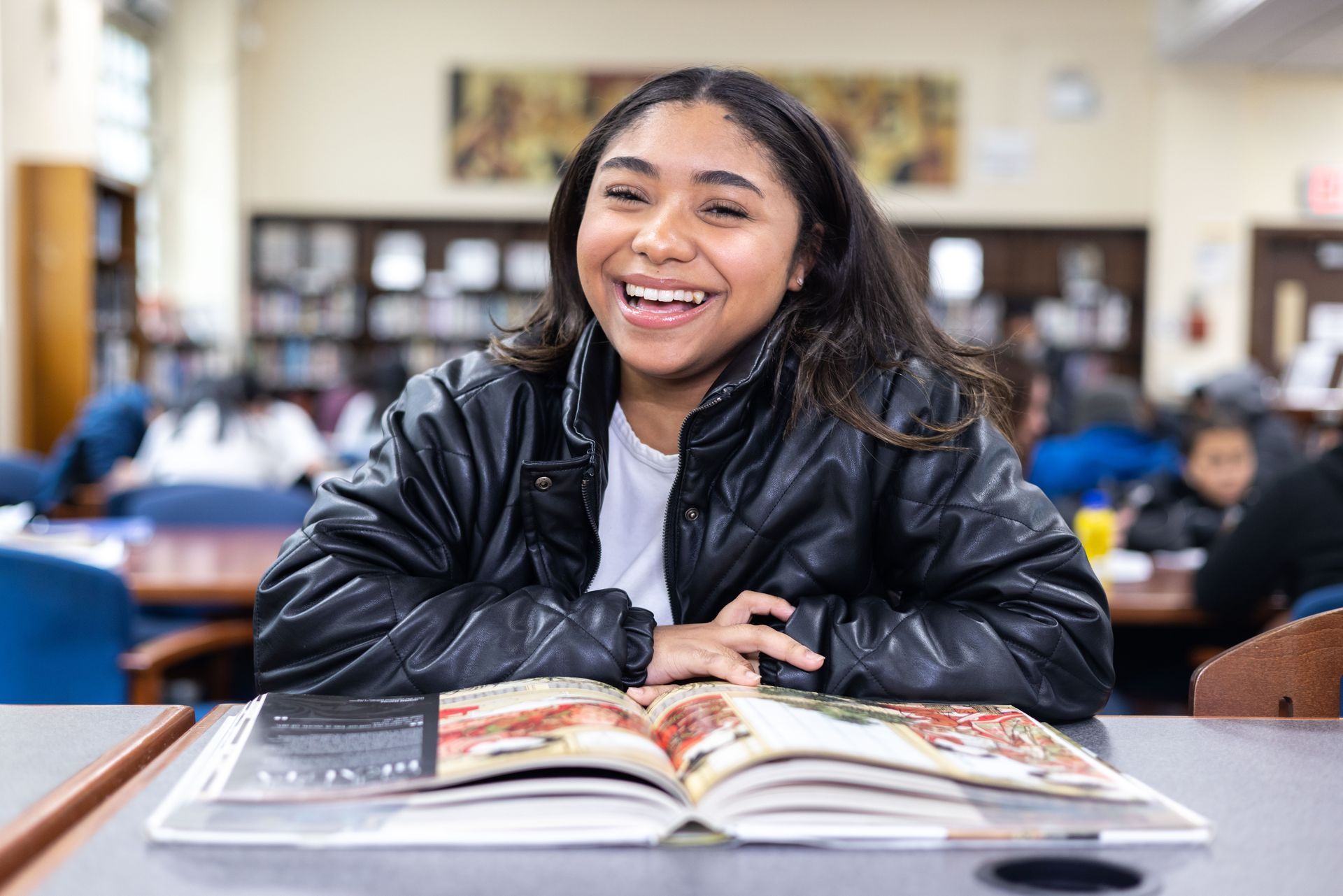 Smiling student in the library