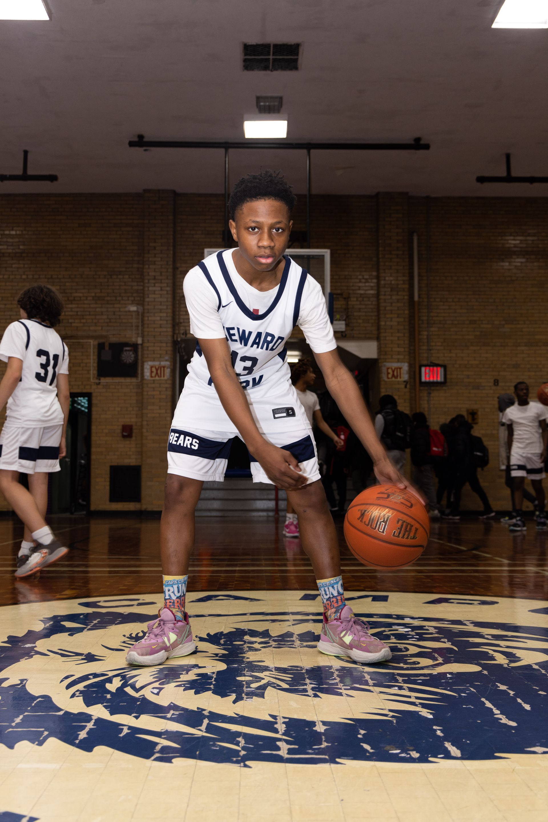 Student basketball player dribbling