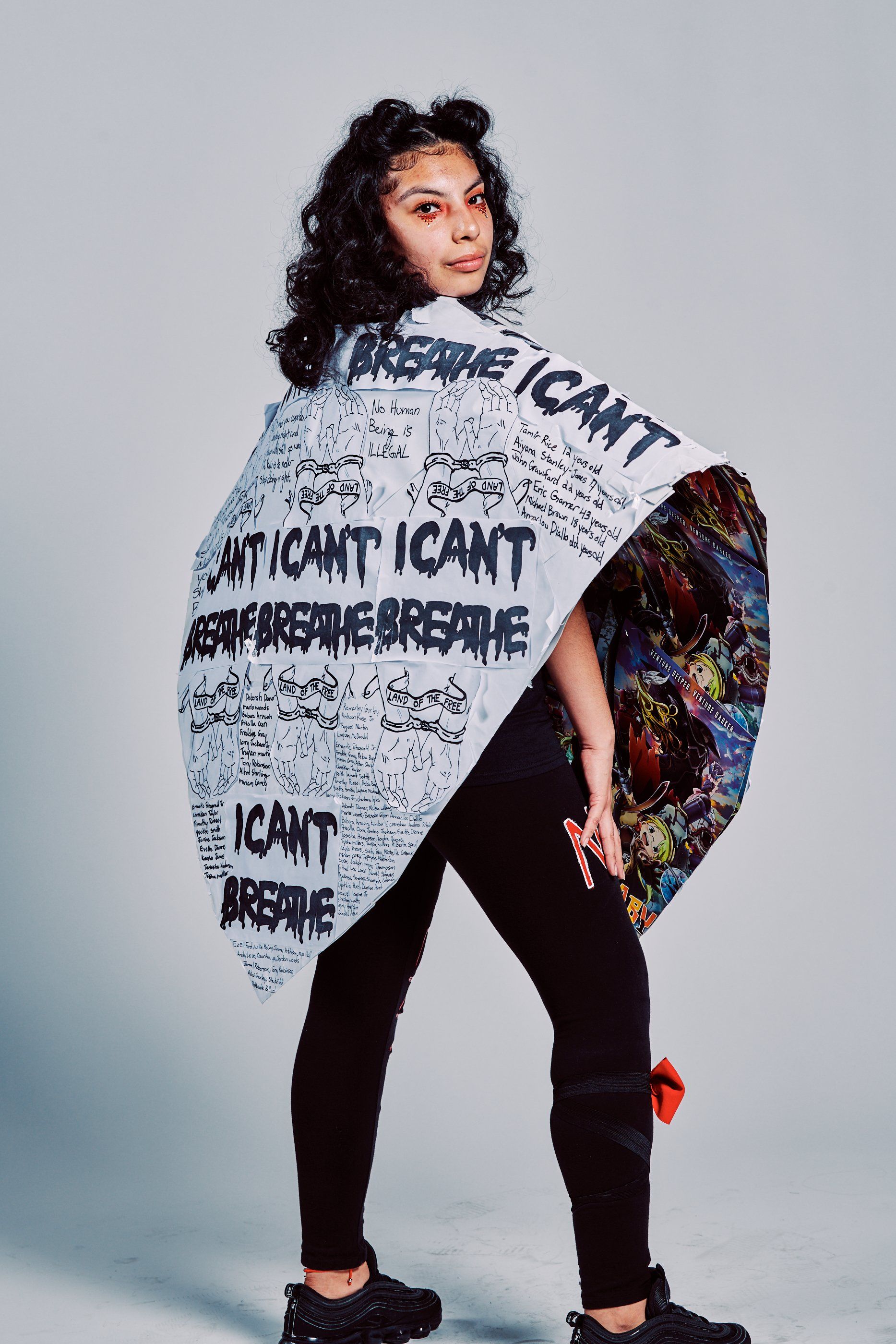 Model in hand-made garment at the 2019 Sustainable Fashion Show at New Design High School