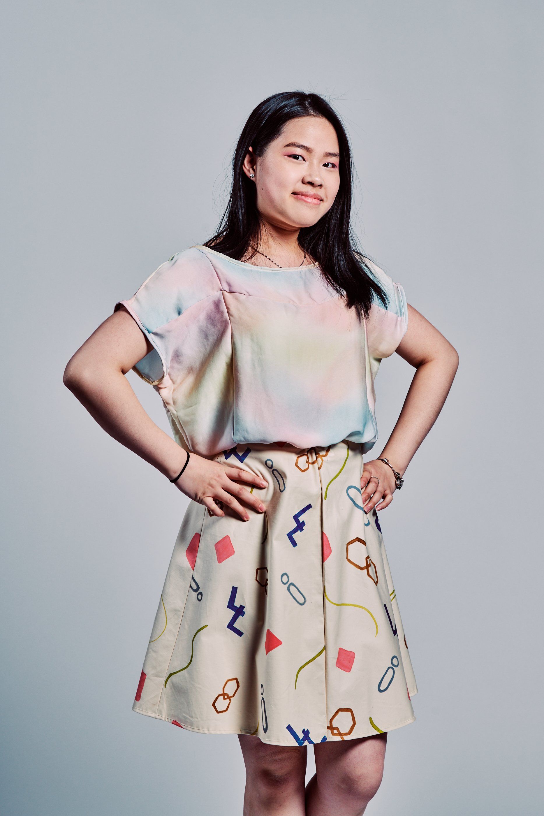 Model in hand-made garment at the 2019 Sustainable Fashion Show at New Design High School