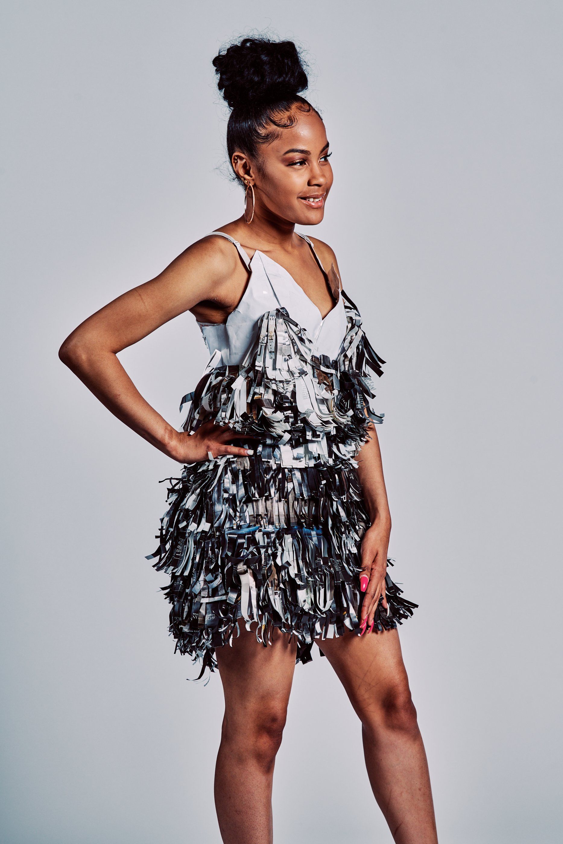 Model in hand-made garment at the 2019 Sustainable Fashion Show at New Design High School