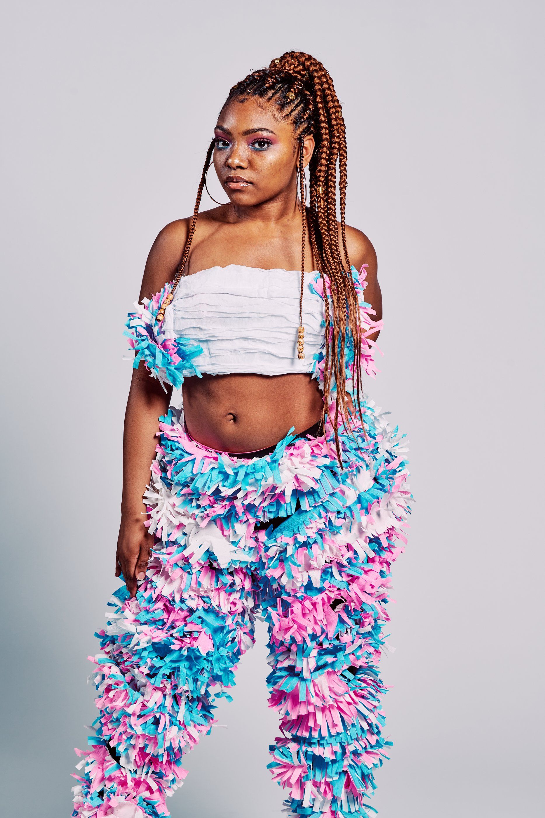 Model in hand-made garment at the 2019 Sustainable Fashion Show at New Design High School