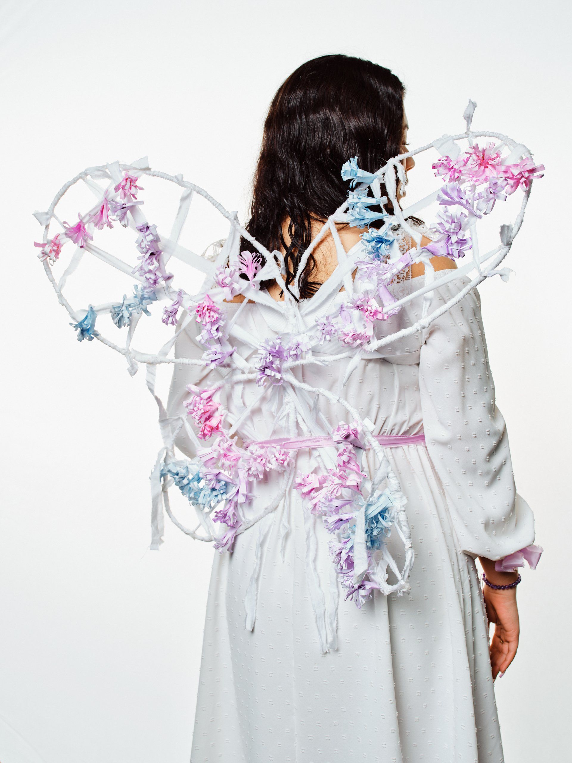 Model in hand-made garment at the 2022 Sustainable Fashion Show at New Design High School. Photo by Christian Rodriguez