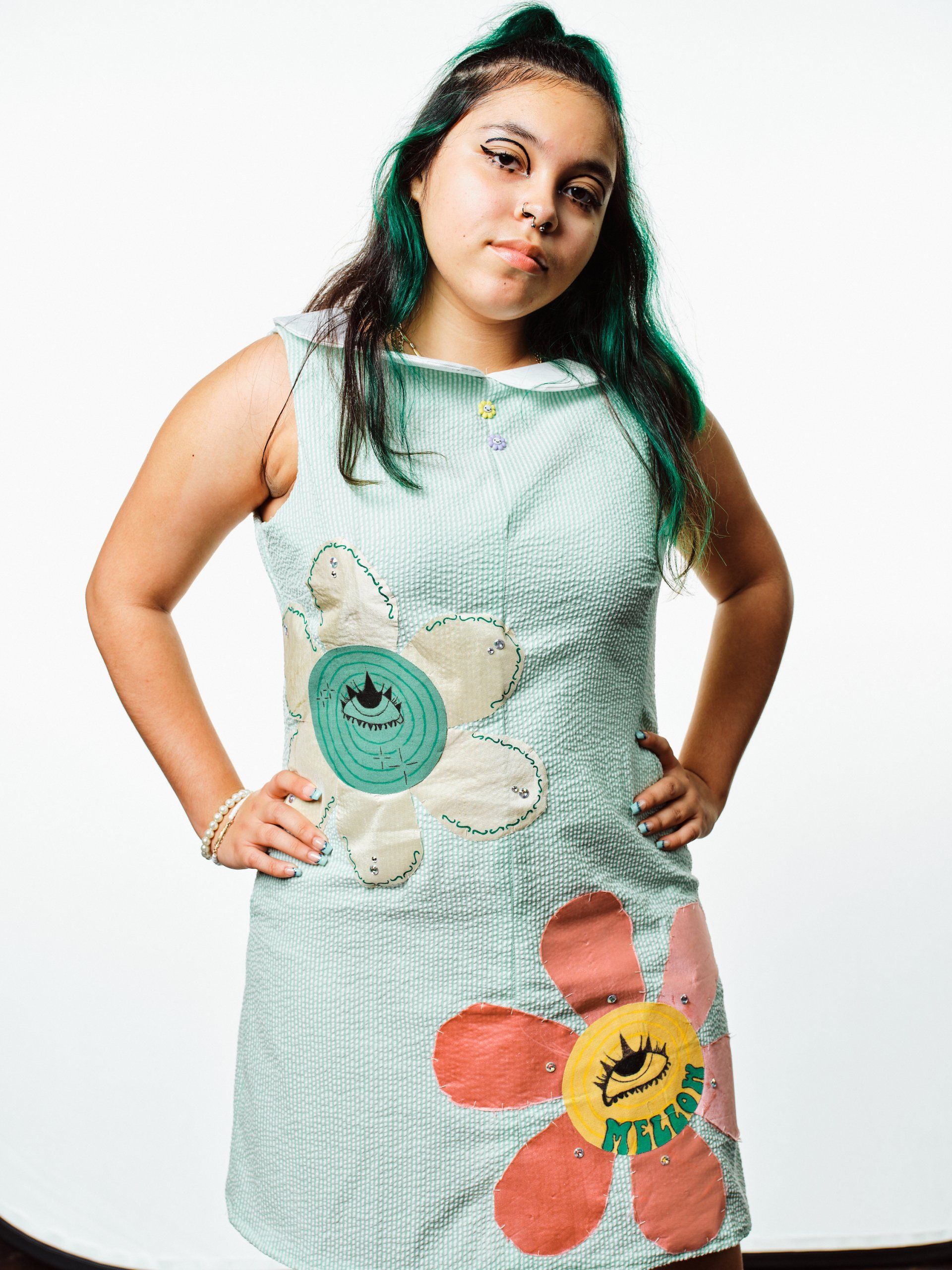 Model in hand-made garment at the 2022 Sustainable Fashion Show at New Design High School. Photo by Christian Rodriguez