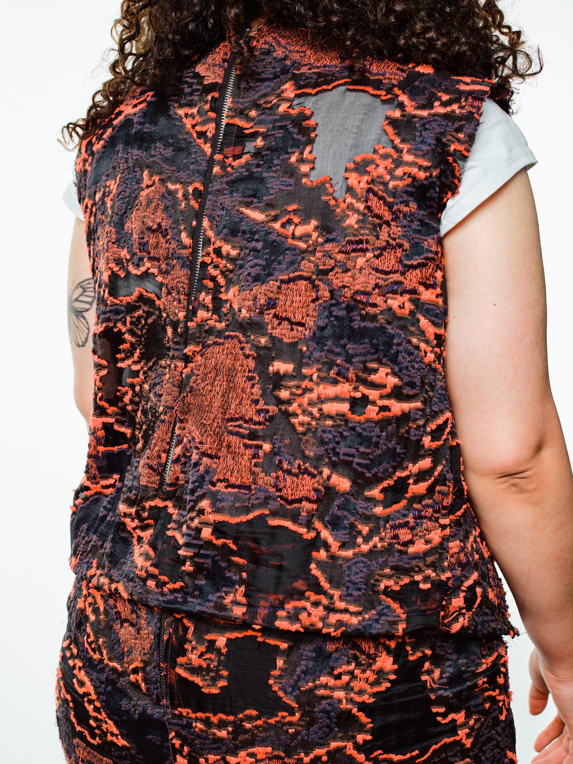 Model in hand-made garment at the 2022 Sustainable Fashion Show at New Design High School. Photo by Christian Rodriguez