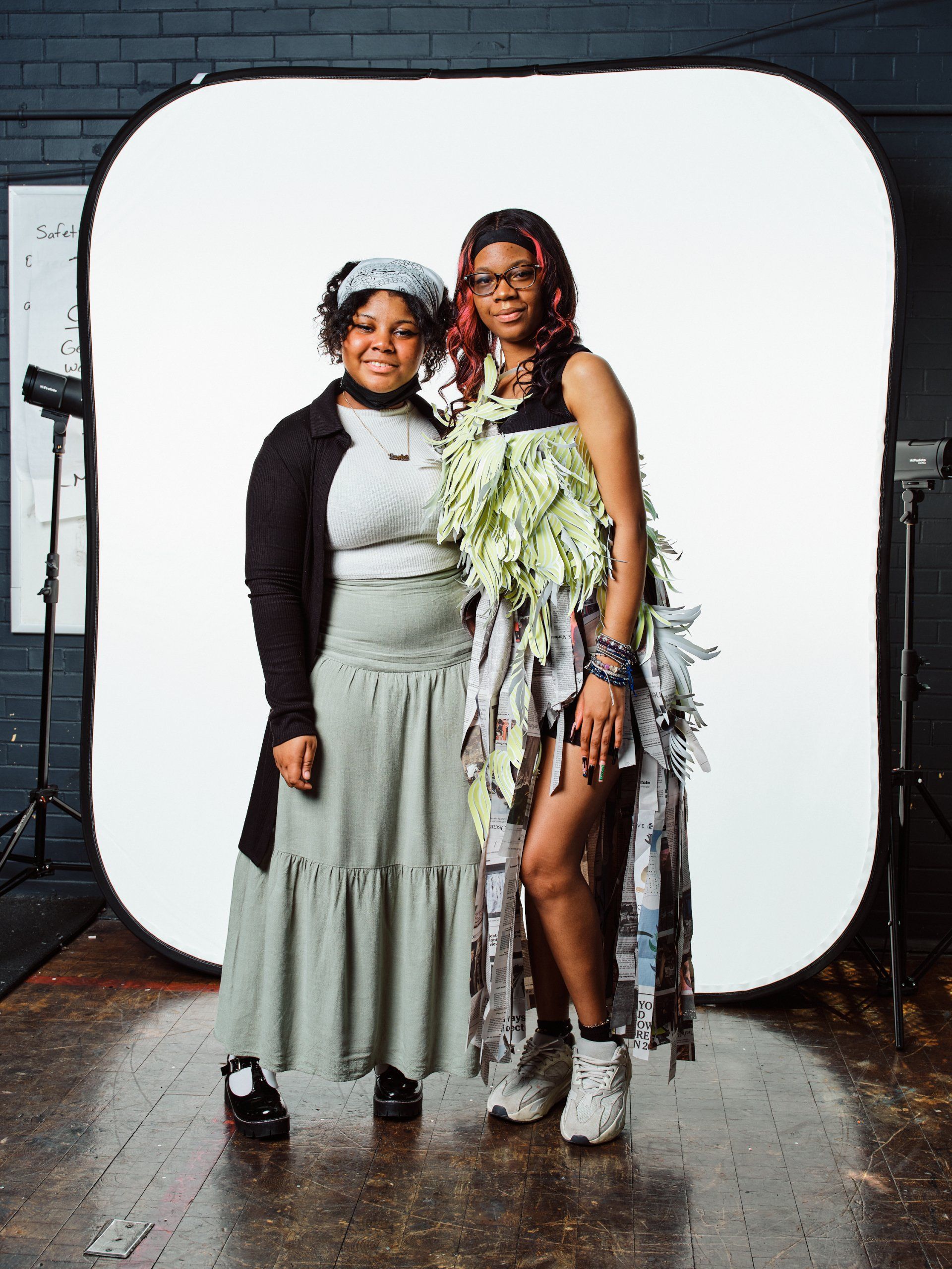 Designer and Model in hand-made garment at the 2022 Sustainable Fashion Show at New Design High School. Photo by Christian Rodriguez
