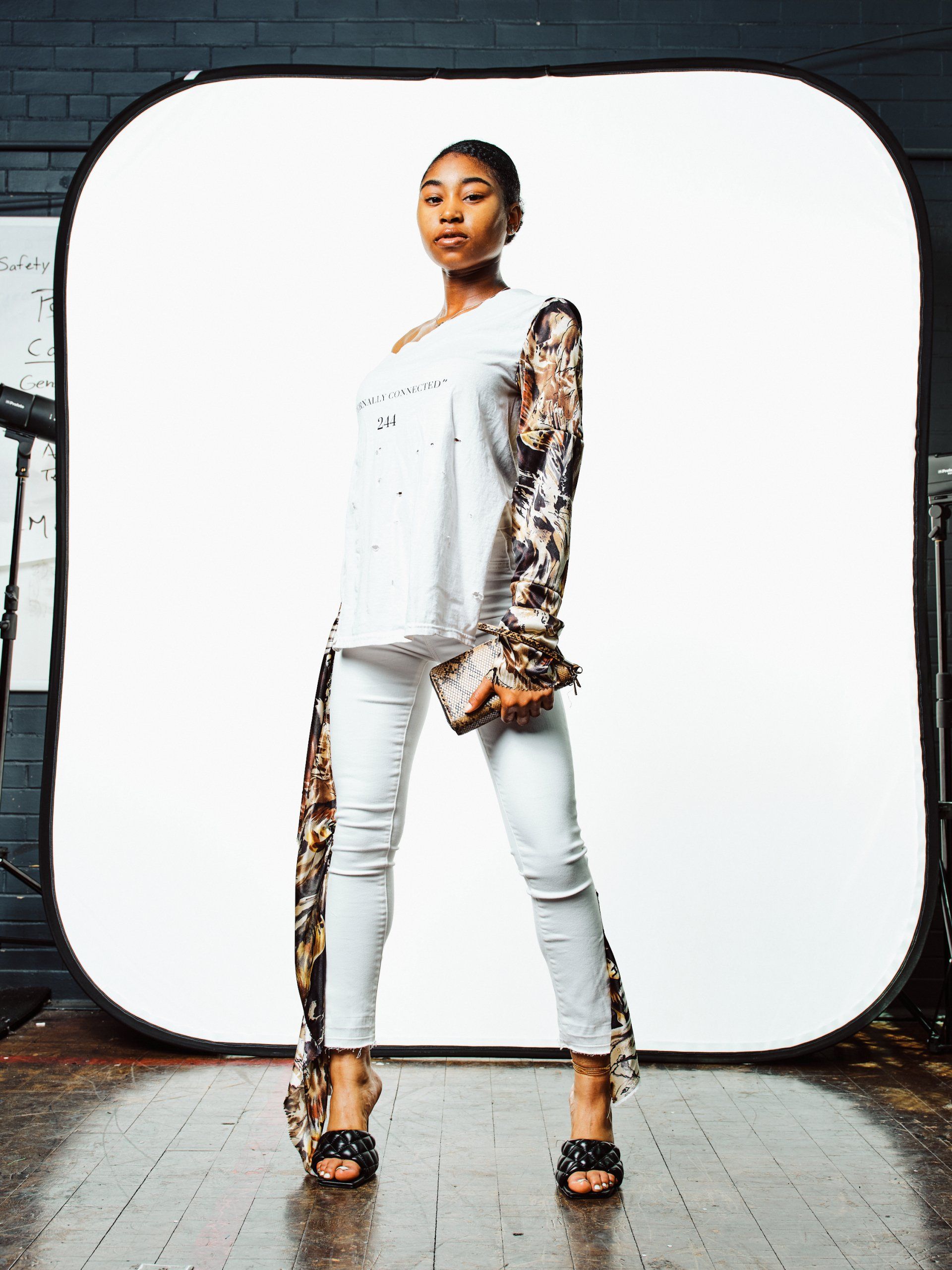 Model in hand-made garment at the 2022 Sustainable Fashion Show at New Design High School. Photo by Christian Rodriguez