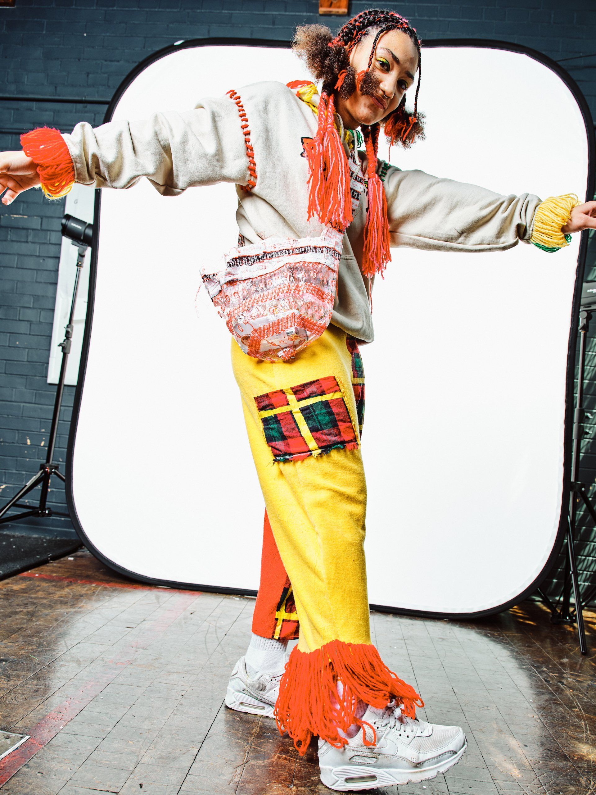 Model in hand-made garment at the 2022 Sustainable Fashion Show at New Design High School. Photo by Christian Rodriguez