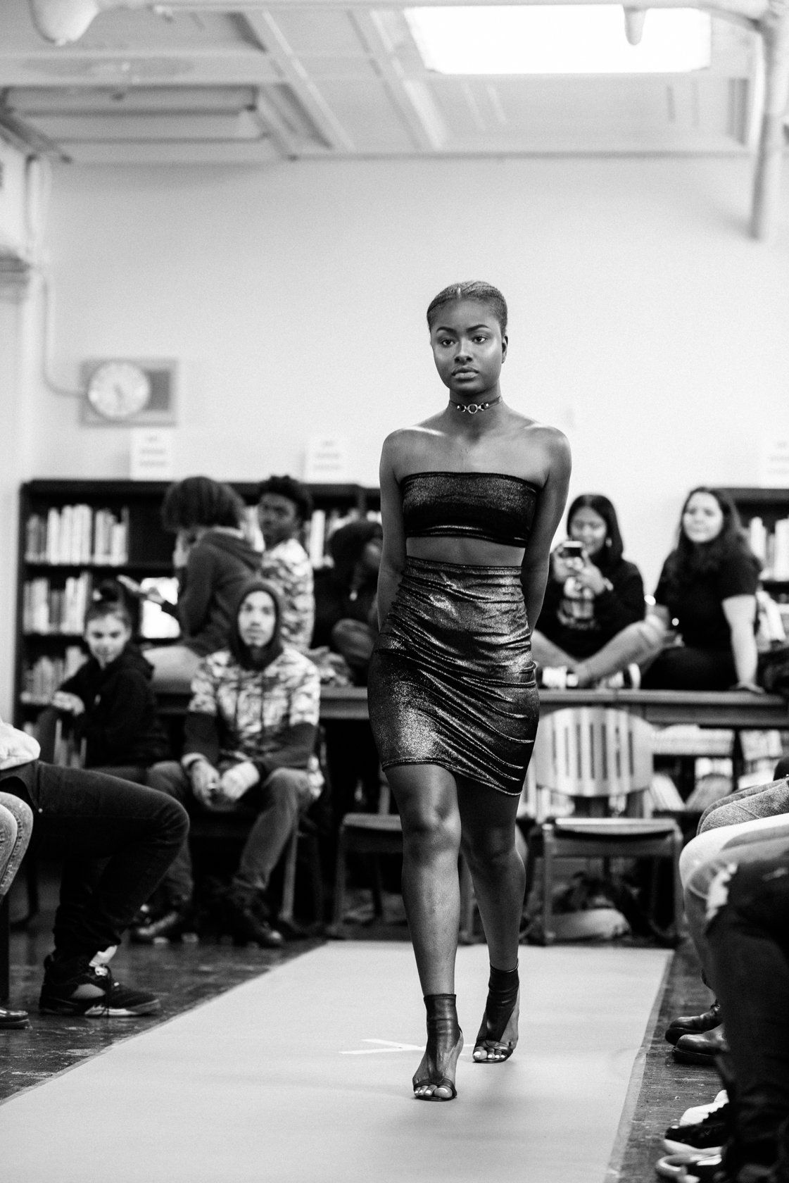 A fashion student walking the runway