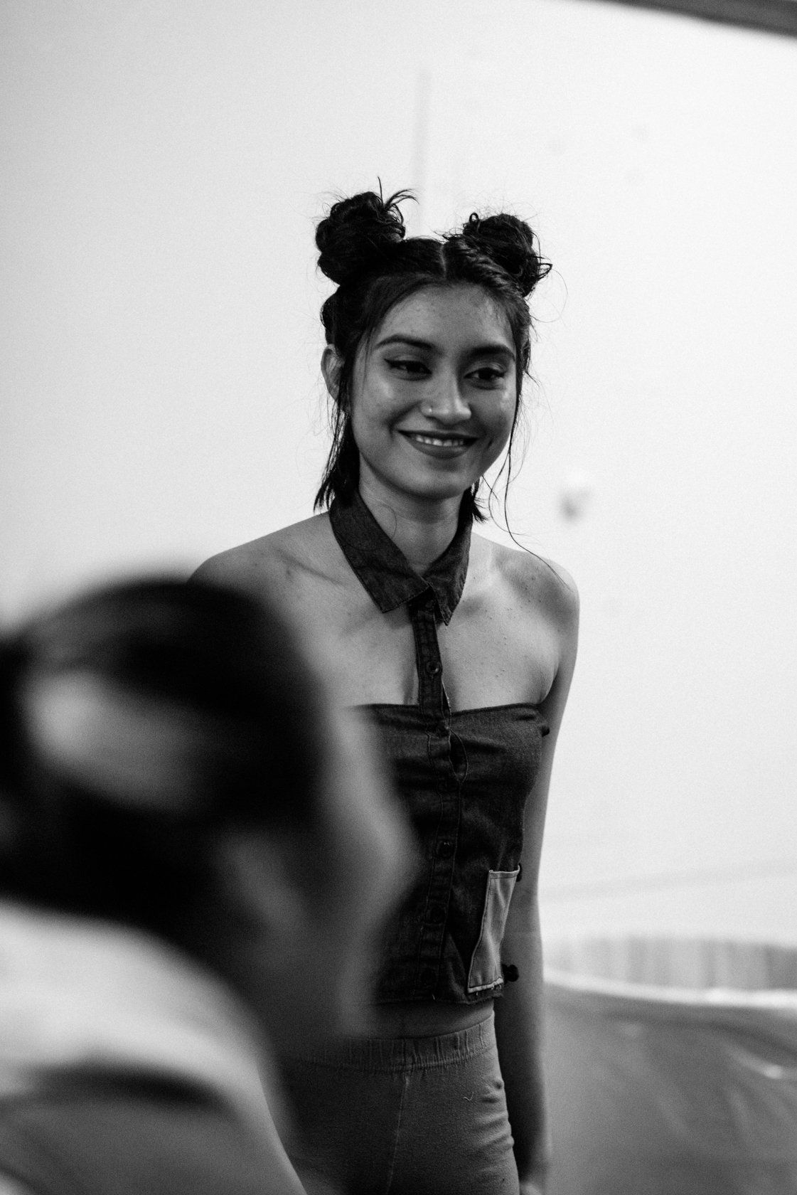 A smiling fashion student