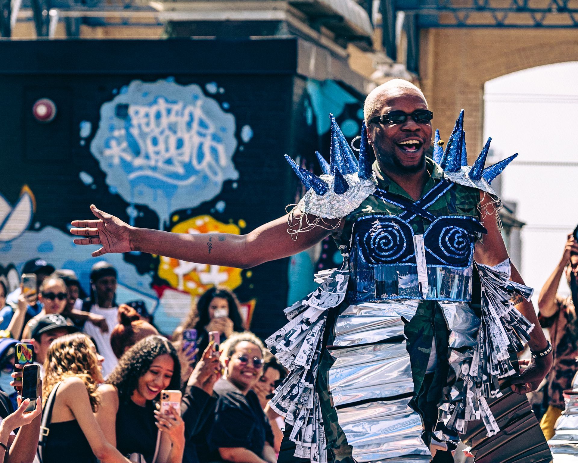 Host in a student-made garment at the 2023 Sustainable Fashion Show at New Design High School. Photo by Luis Suarez