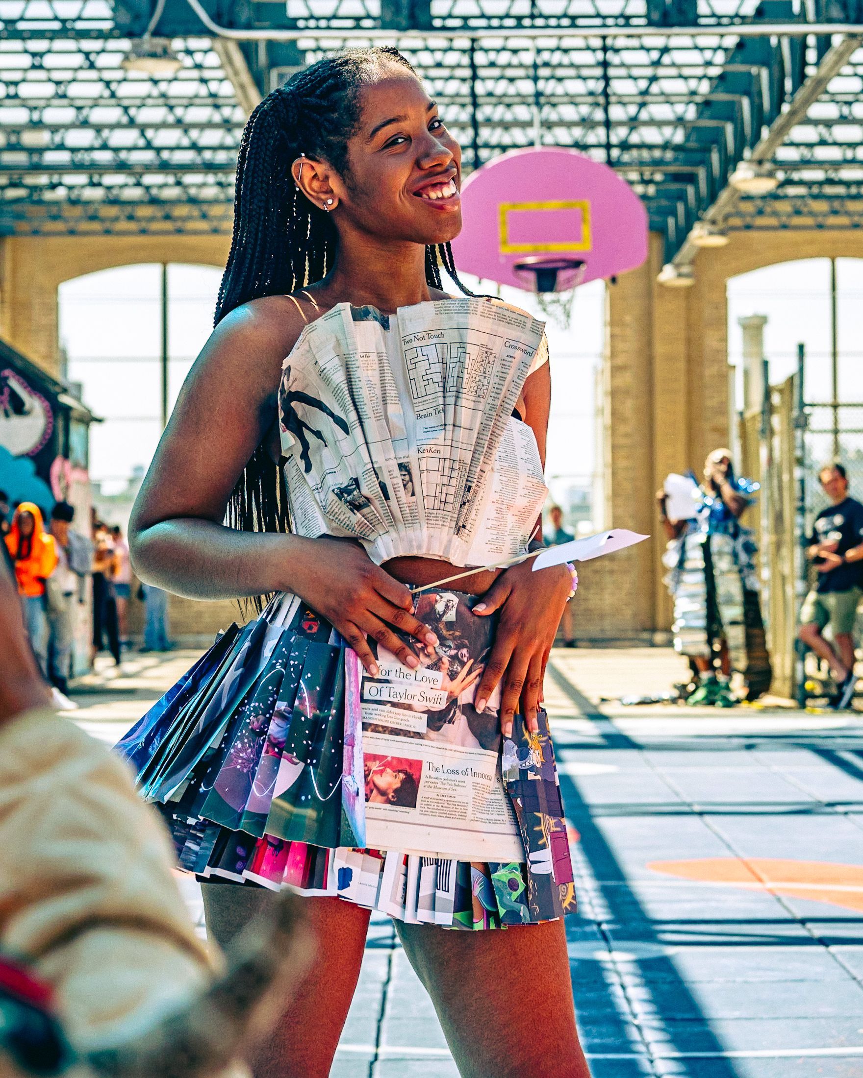 Model in hand-made garment at the 2023 Sustainable Fashion Show at New Design High School. Photo by Luis Suarez