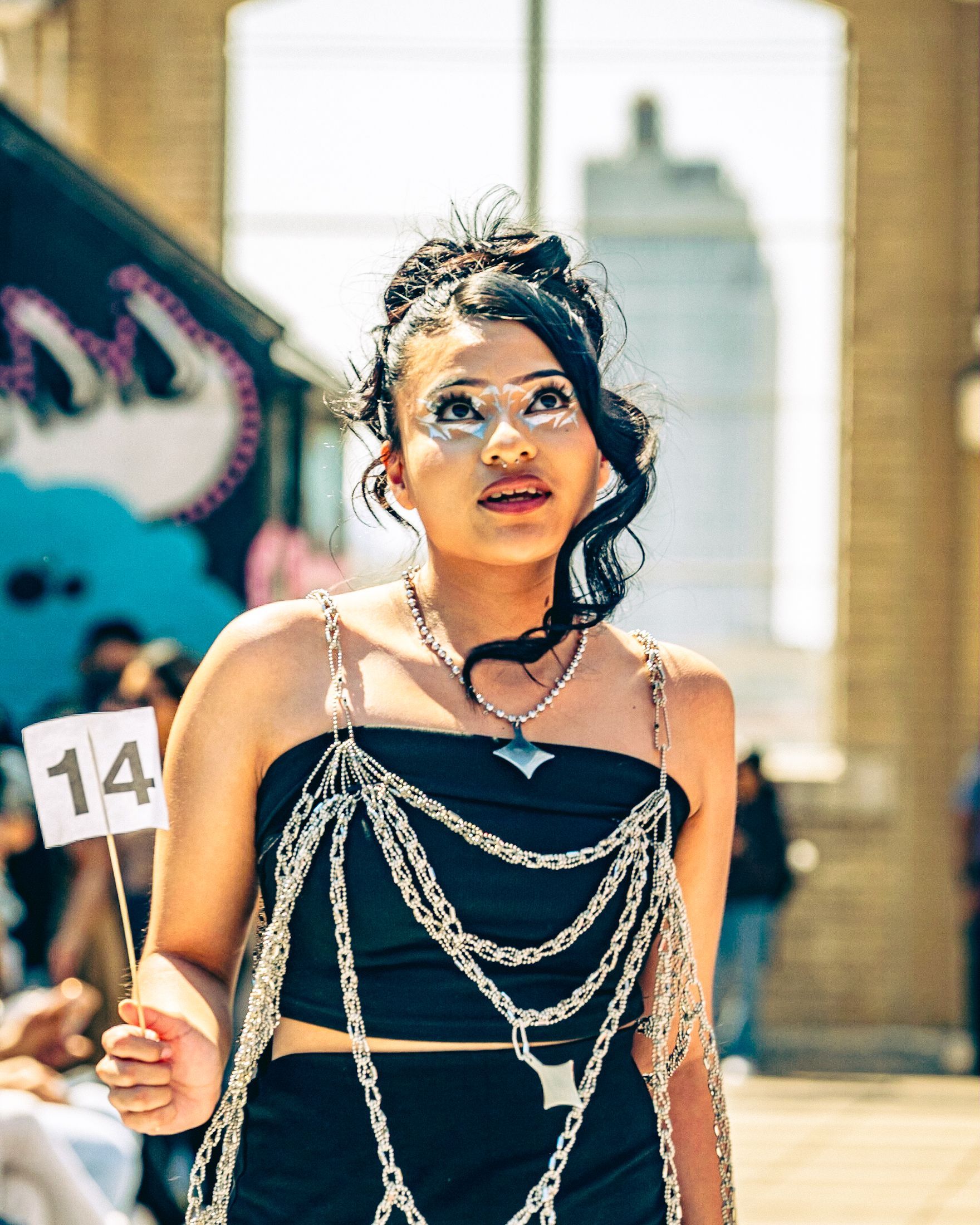 Model in hand-made garment at the 2023 Sustainable Fashion Show at New Design High School. Photo by Luis Suarez