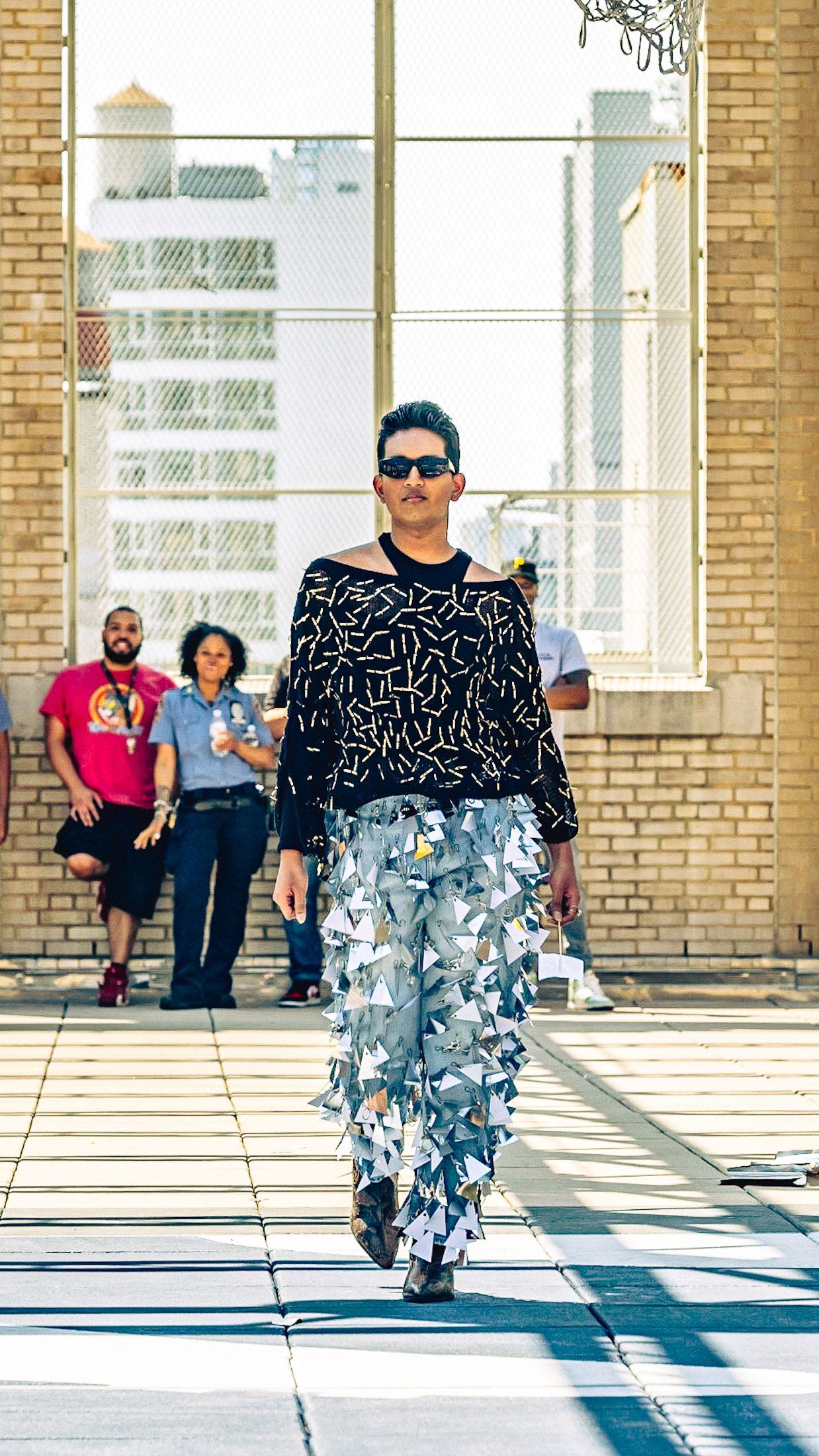 Model in hand-made garment at the 2023 Sustainable Fashion Show at New Design High School. Photo by Luis Suarez