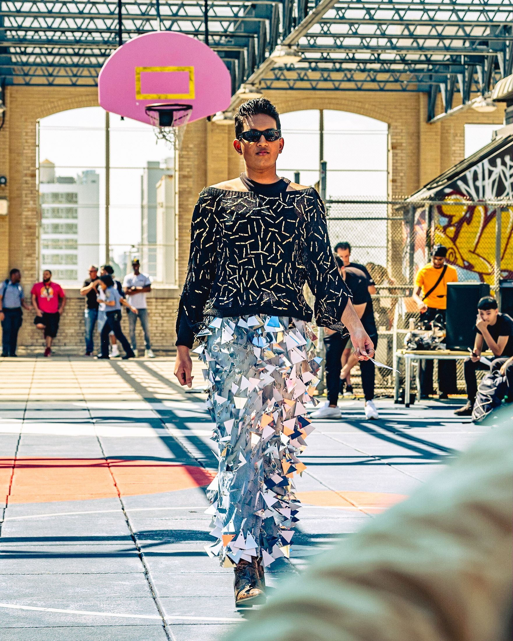 Model in hand-made garment at the 2023 Sustainable Fashion Show at New Design High School. Photo by Luis Suarez