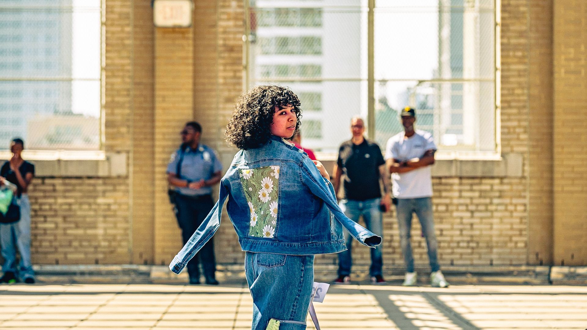 Model in hand-made garment at the 2023 Sustainable Fashion Show at New Design High School. Photo by Luis Suarez