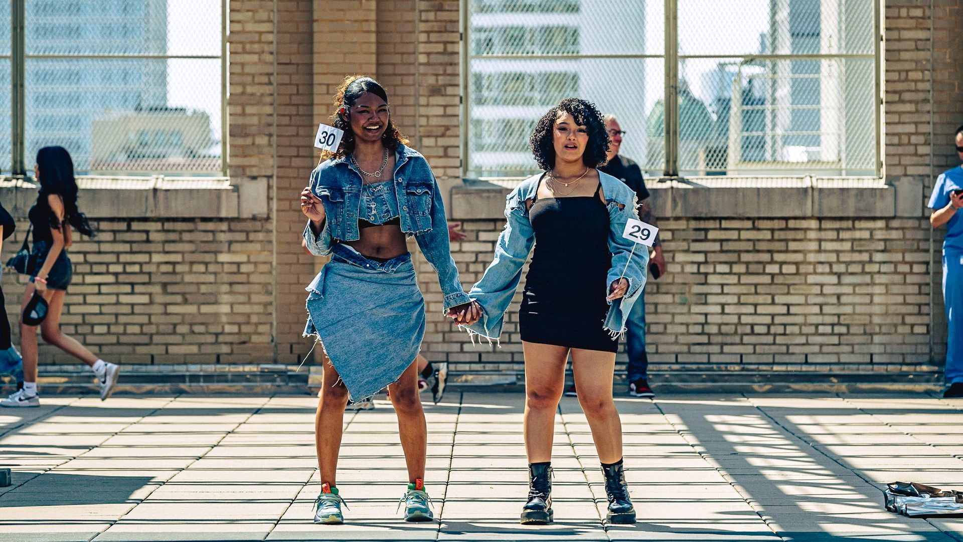Model in hand-made garment at the 2023 Sustainable Fashion Show at New Design High School. Photo by Luis Suarez