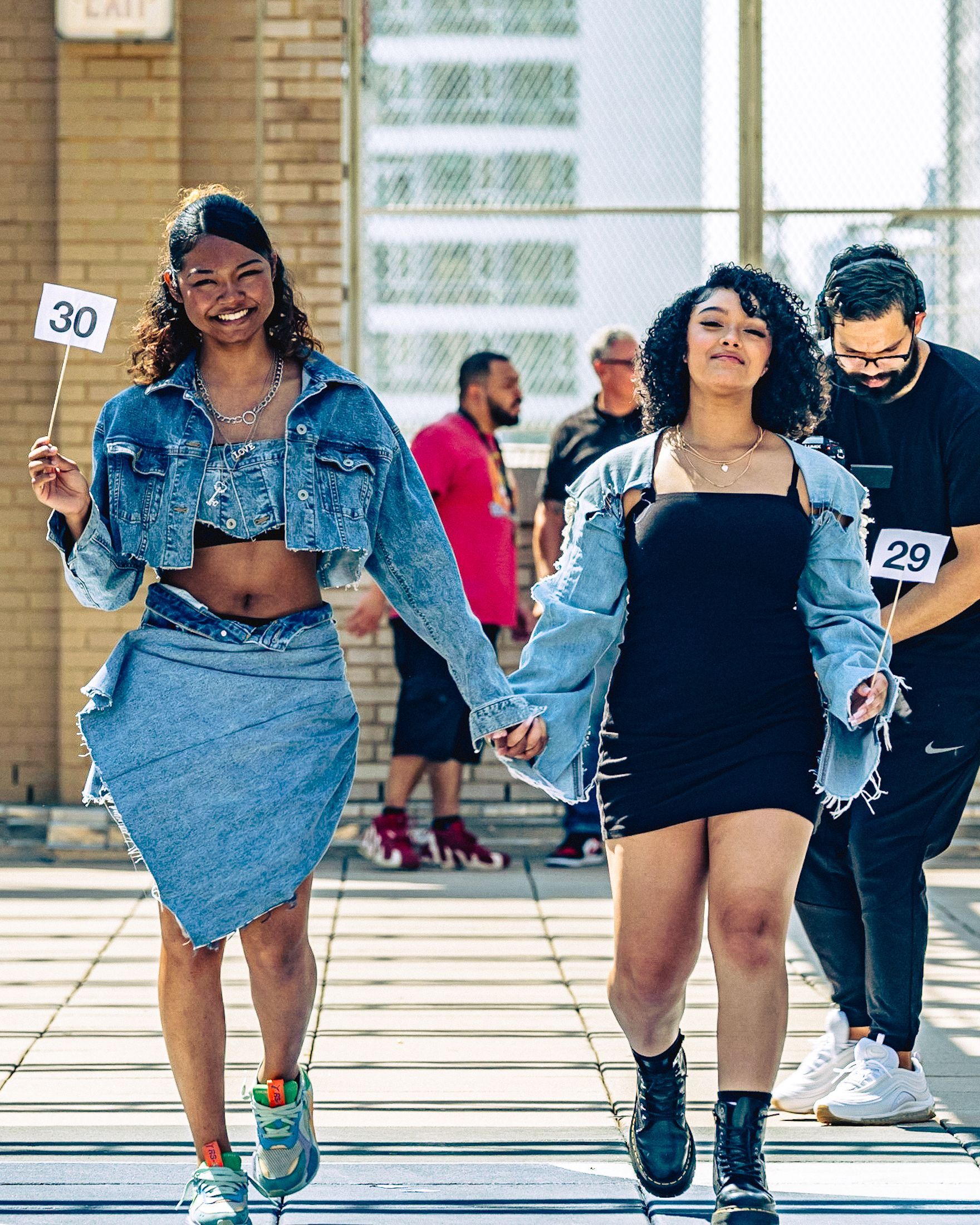 Model in hand-made garment at the 2023 Sustainable Fashion Show at New Design High School. Photo by Luis Suarez