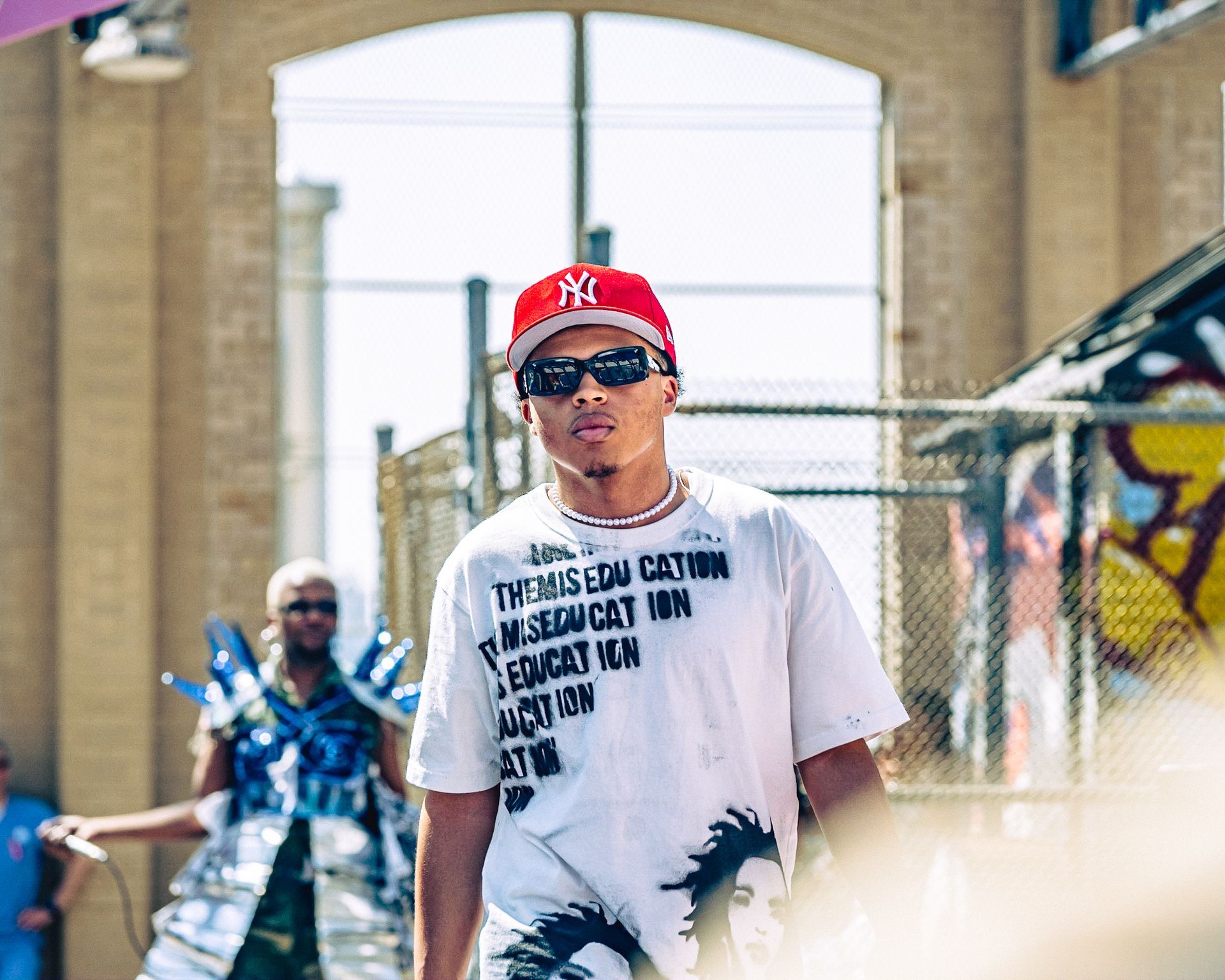 Model in hand-made garment at the 2023 Sustainable Fashion Show at New Design High School. Photo by Luis Suarez